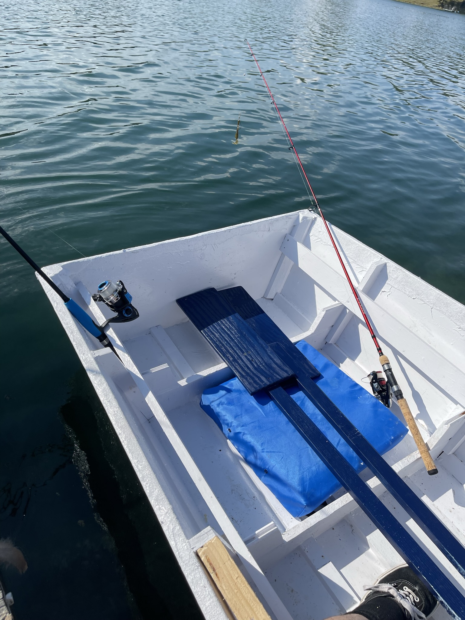 Finished wooden boat on the water